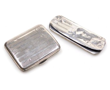 A George V silver cigarette case, with engine turned decoration, rectangular reserve, monogram engraved, Birmingham 1928, 2.5