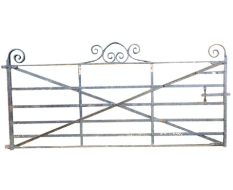 A large cast iron garden gate, 277cm wide, 130cm high.