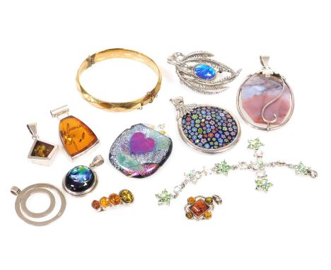 Silver and costume jewellery, including a millefiori pendant, four amber pendants and a gold plated bangle.