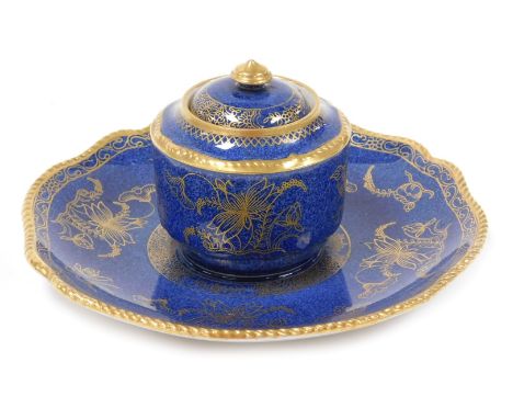 An late 19thC Copeland Spode pottery inkwell, on an integral stand, decorated with chinoiserie flowers, on a powder blue grou