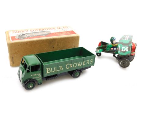 A Dinky Super Toys Guy 4-ton lorry, number 511, boxed, together with a Louis Marx and Company tin plate clockwork airplane wi