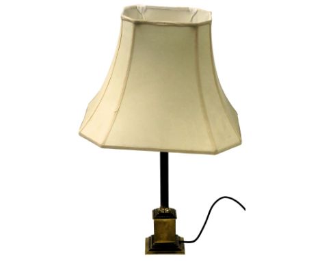 A brass column table lamp, on a square base with cream shade, 71cm high.Buyer Note: WARNING! This lot contains untested or un