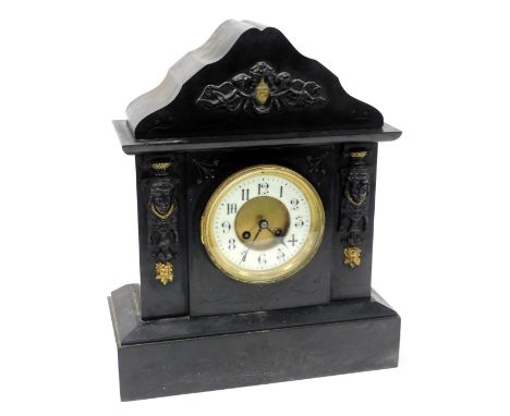 A late 19thC slate mantel clock, circular brass dial with enamel chapter ring bearing Arabic numerals, eight day movement wit