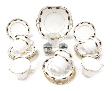 A Coalport porcelain St. Malo pattern part tea service, comprising, bread plate, cream jug, eight teacups, saucers and tea pl