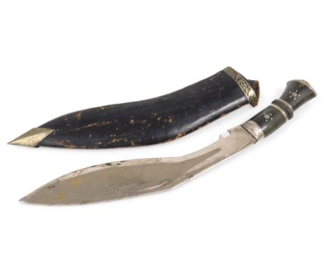 A 20thC Kukhri, with an inlaid horn handle, and leather scabbard, 45cm long.