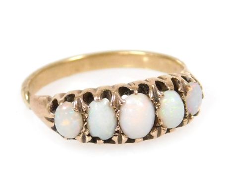 An opal five stone ring, in yellow metal, unmarked, size O, 3.0g.