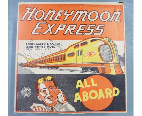 Louis Marx &amp; Co The Honeymoon Express clockwork tinplate train, in original box.&nbsp;