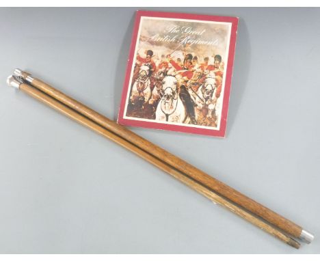 Hallmarked silver topped malacca cane, Royal Artillery stick and a collector's folder of badges