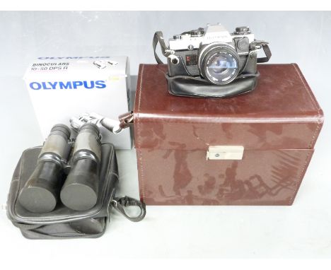 Olympus OM10 SLR camera with 1:1.8 f=50mm lens, Bell &amp; Howell 1:4.5 80-205mm lens, MC7 Teleplus 2x converter, manuals etc