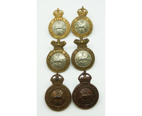 Six British Army 5th Dragoon Guards metal collar badges with Victorian and Imperial crowns