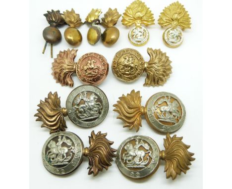 Twelve British Army Royal Northumberland Fusiliers metal collar badges etc