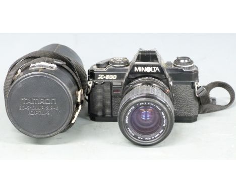 Minolta X-500 SLR camera with Sigma 1:2.8-4 f=35-70mm and 1:4.5 f=100-200mm lenses