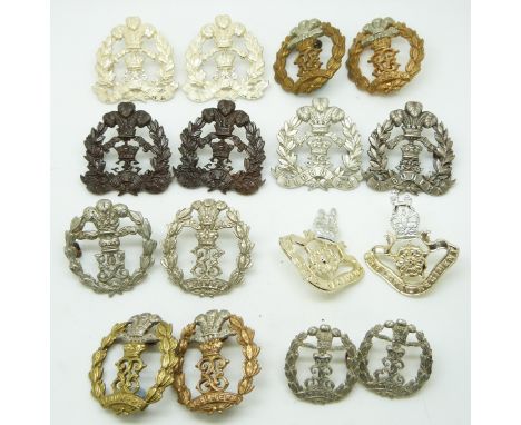 Sixteen British Army Middlesex Regiment metal badges in six pairs plus four including an officer's pair and one badge without