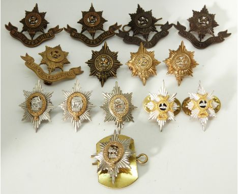 Fourteen British Army Worcestershire Regiment metal collar badges in six pairs plus two, one pair marked J.R.Gaunt