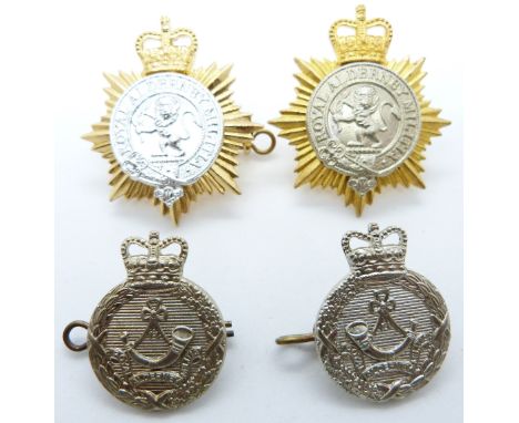 Four British Army Alderney Militia badges including an anodised example