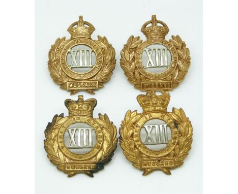 Four British Army 13th Hussars metal badges with Imperial and Queen's crowns