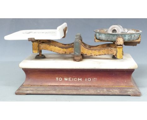 Set of shop scales with ceramic pan and marble panel, length 50cm, together with a run of bell weights&nbsp;