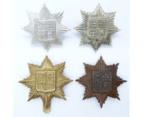 Four British Army 13th County of London Battalion (Kensington) metal cap badges