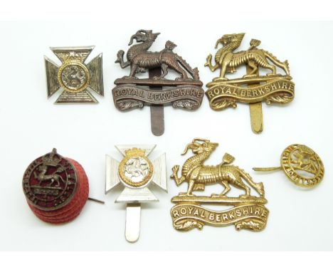 Seven British Army Royal Berkshire Regiment metal badges including officer's BOSS example