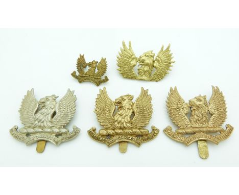 Five British Army Earl of Carrick's Own Ayrshire Yeomanry metal badges including a collar badge