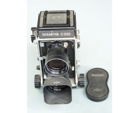 Mamiya C220 Professional TLR camera with Mamiya-Sekor 1:4.5 f=135mm lens, serial number of camera B 111079, with lens hood