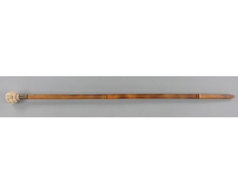 Bamboo swordstick with handle formed as four faces with different expressions, and a hexagonal 67cm spike&nbsp;