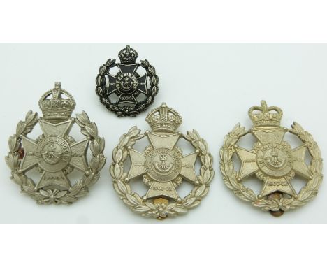 Four British Army Sherwood Rangers 7th Battalion (Robin Hood's) metal cap badges including a field service example