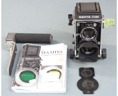 Mamiya C220 Professional TLR camera with Mamiya-Sekor 1:2.8 f=80mm lens, serial number of camera B 109479, with handle, level