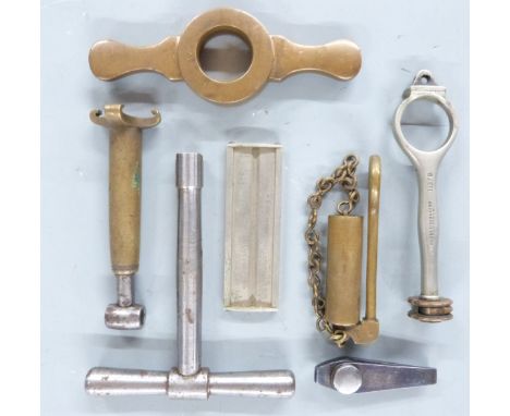 Seven gun or shooting related tools including James Dixon &amp; Sons 1137B and similar shotgun cartridge extractors, nipple k