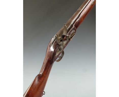 Flintlock hammer action gun with steel butt plate trigger guard and ram-rod, sling suspension mounts and 38 inch barrel stamp