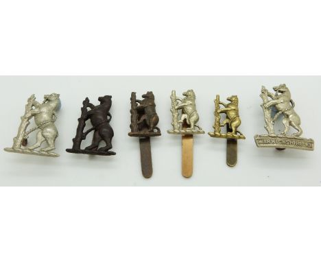 Six British Army&nbsp;Warwickshire Yeomanry metal badges including an Imperial Yeomanry and white metal examples