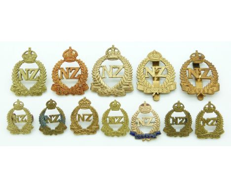 Twelve New Zealand Army WWI New Zealand Expeditionary Force metal hat and collar badges including an enamelled pin badge, two