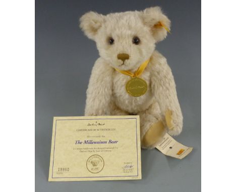Steiff for Danbury Mint Teddy bear The Millennium Bear with blonde mohair, gold plated medallion and jointed limbs, 30cm tall