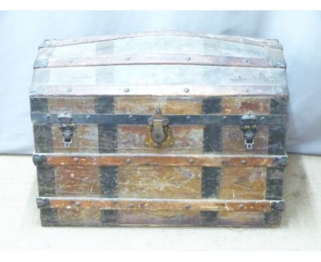 Ash and metal bound dome topped travelling trunk together, width 82cm with an animal skin rug&nbsp;