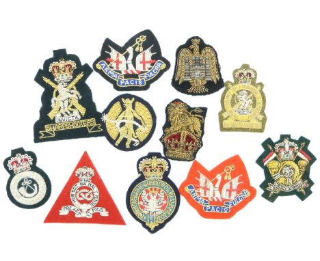 Eleven British Army Sharpshooters, Sherwood Rangers, Kings Own Yorkshire Yeomanry etc bullion badges