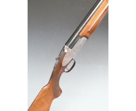Rizzini 12 bore over and under ejector shotgun with engraved locks, underside, top plate, thumb lever and trigger guard, cheq