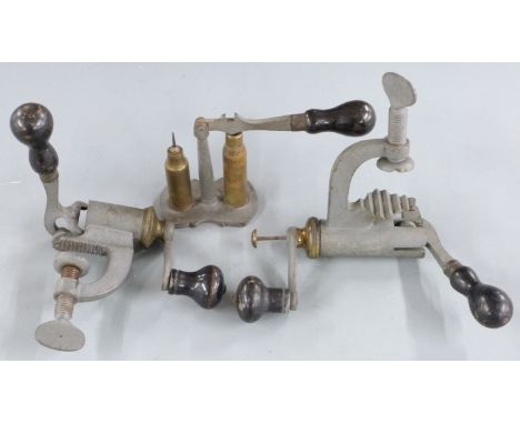 Three shotgun cartridge reloading tools comprising two 12 bore rollover tools, one 12 bore the other 16, and a cartridge capp