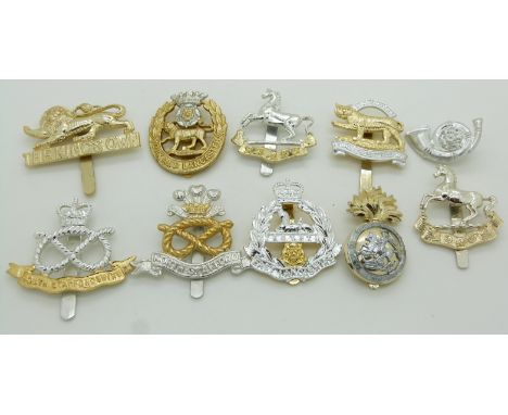 Ten British Army Infantry anodised cap badges including York and Lancaster Regiment, North Staffs Regiment and King's Regimen