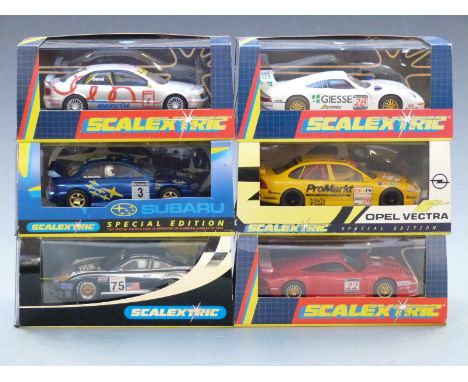 Six Hornby Scalextric model motor racing cars comprising two special edition Opel Vectra Promarket 4362 of 5000 C.2000 and Su