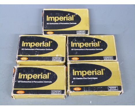 Twenty-six Imperial 6.5mm Mannlicher Schoenauer rifle cartridges together with a collection of empty brass cases, in five box