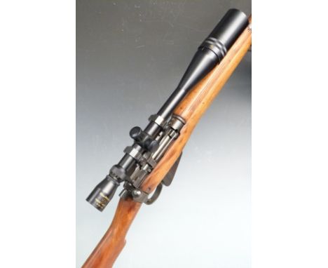 Short Magazine Lee Enfield SMLE No.4 Mk I .303 bolt-action rifle stamped at the wrist M47 1943' with steel butt plate and mou