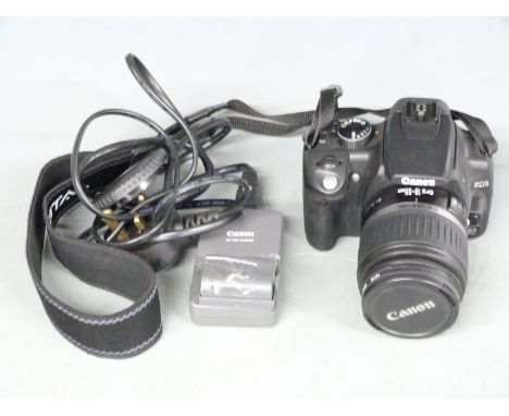 Canon EOS 350D digital SLR camera with Canon 18-55mm 1:3.5-5.6 lens and battery charger