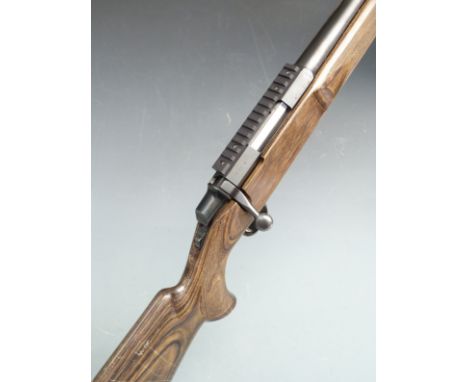 Browning .22-250 bolt-action rifle with show wood stock, chequered semi-pistol grip and forend, sling suspension mounts, scop