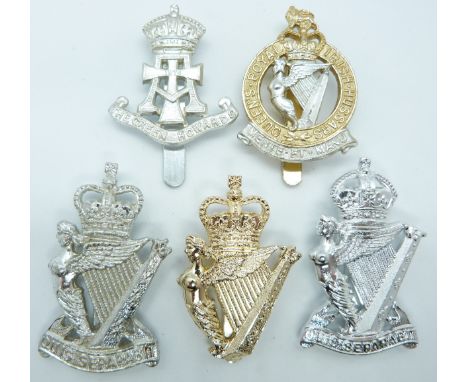 Five British Army Infantry Royal Ulster Rifles, Queen's Royal Irish Regiment and Green Howard anodised cap badges, two marked