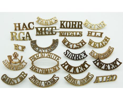 Small collection of British Army metal shoulder titles including Norfolk Yeomanry, Welsh Regiment, Parachute Regiment, Royals