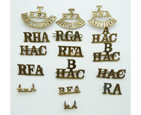 Sixteen British Army Artillery metal shoulder titles for the Honorable Artillery Company, Royal Field Artillery including thr