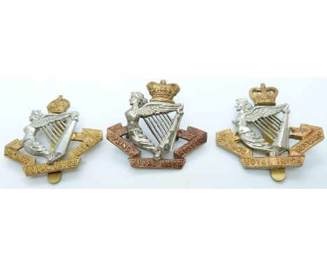 Three British Army 8th King's Own Royal Irish Hussars metal cap badges including Victorian example
