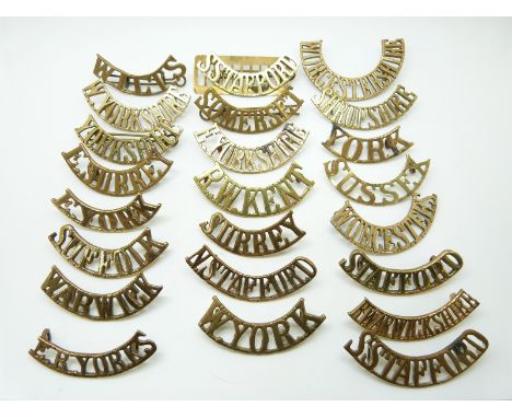 British Army small collection of Infantry County Regiments metal shoulder titles including Suffolk, York, Surrey, Royal West 