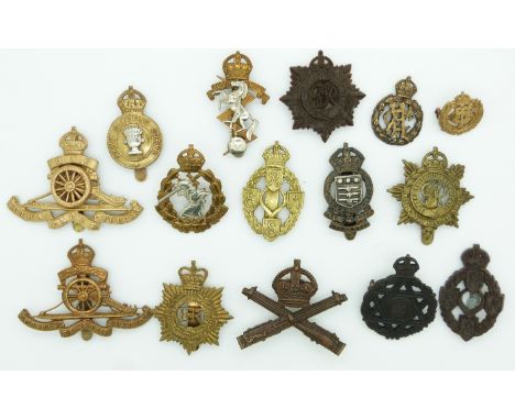 Fifteen British Army Royal Artillery, REME, Army Service Corps badges including two economy plastic examples, one by Gaunt an