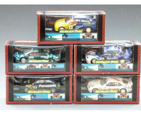 Five Hornby Scalextric model motor racing cars comprising Ford Escort Cosworth Panasonic C.204, Ford Escort Cosworth Pilot C.